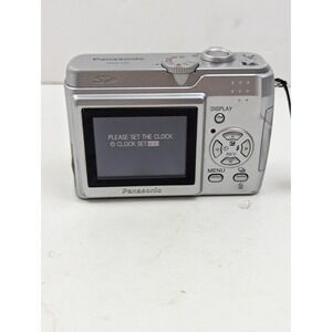 Panasonic DMC-LS1 Digital Camera 4.0MP Silver For Parts or Repair Stuck Lens‎